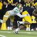 Michigan senior wide receiver Junior Hemingway powers past Notre Dame safety Harrison Smith during the second quarter against Notre Dame on Saturday. Melanie Maxwell I AnnArbor.com